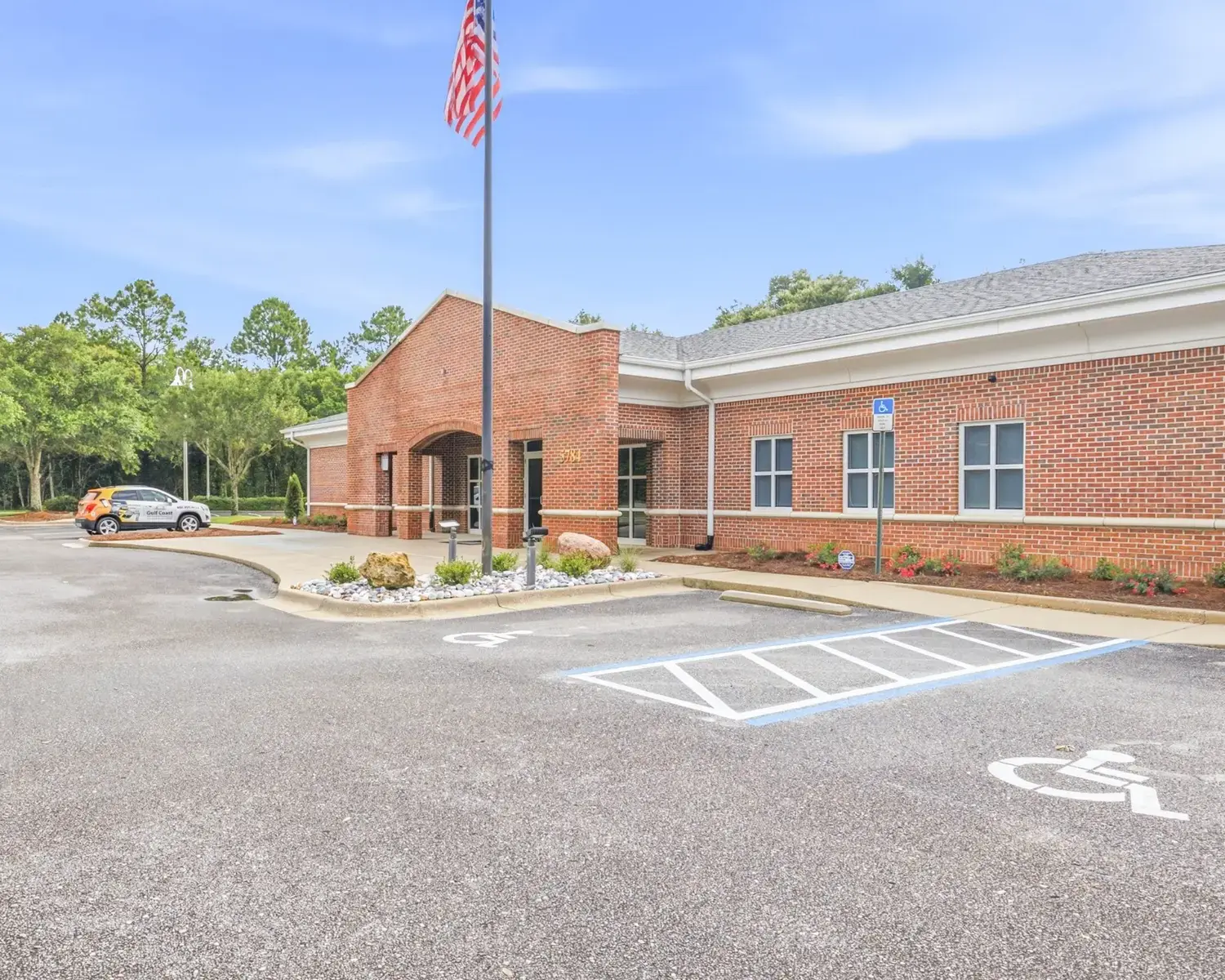 Front entrance of Cadenhead Legacy Center with the 5784 address numerals beside the doors