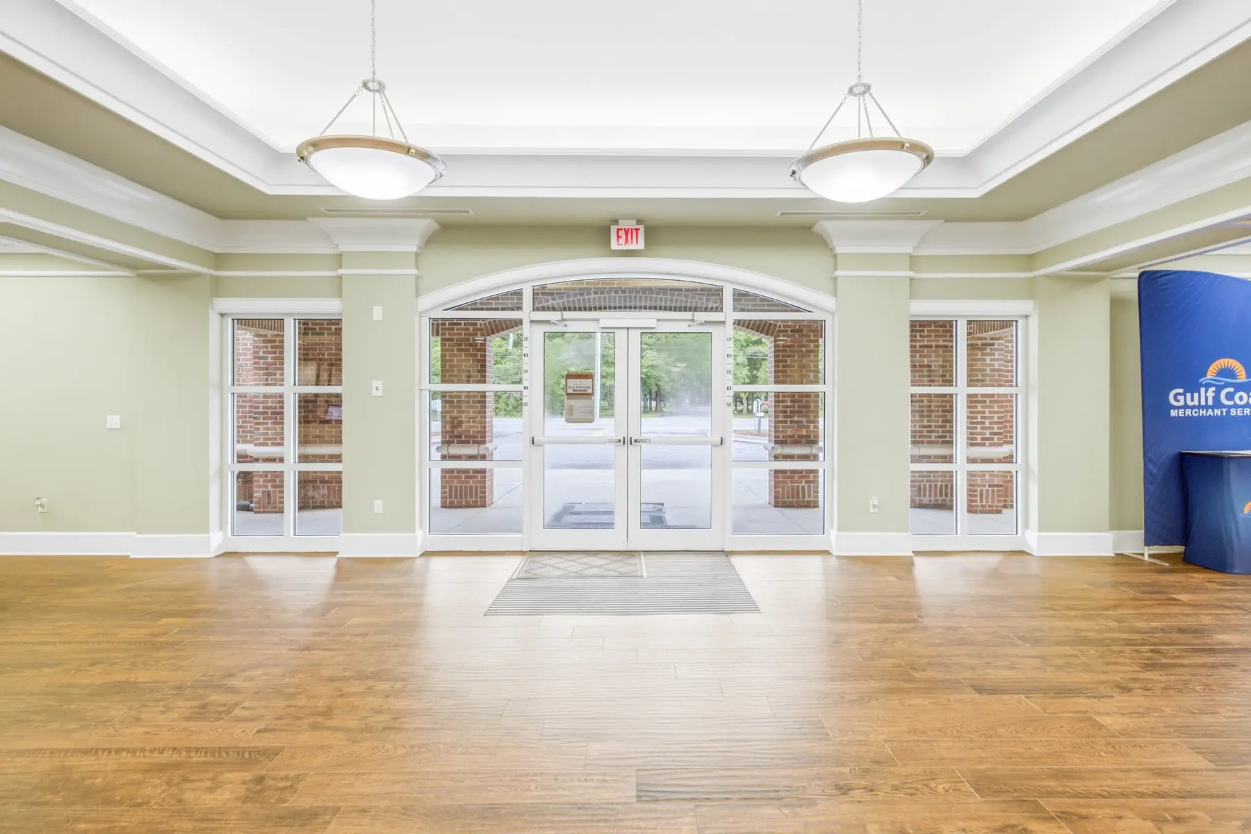 Glass entrance doors and front lobby inside Cadenhead Legacy Center